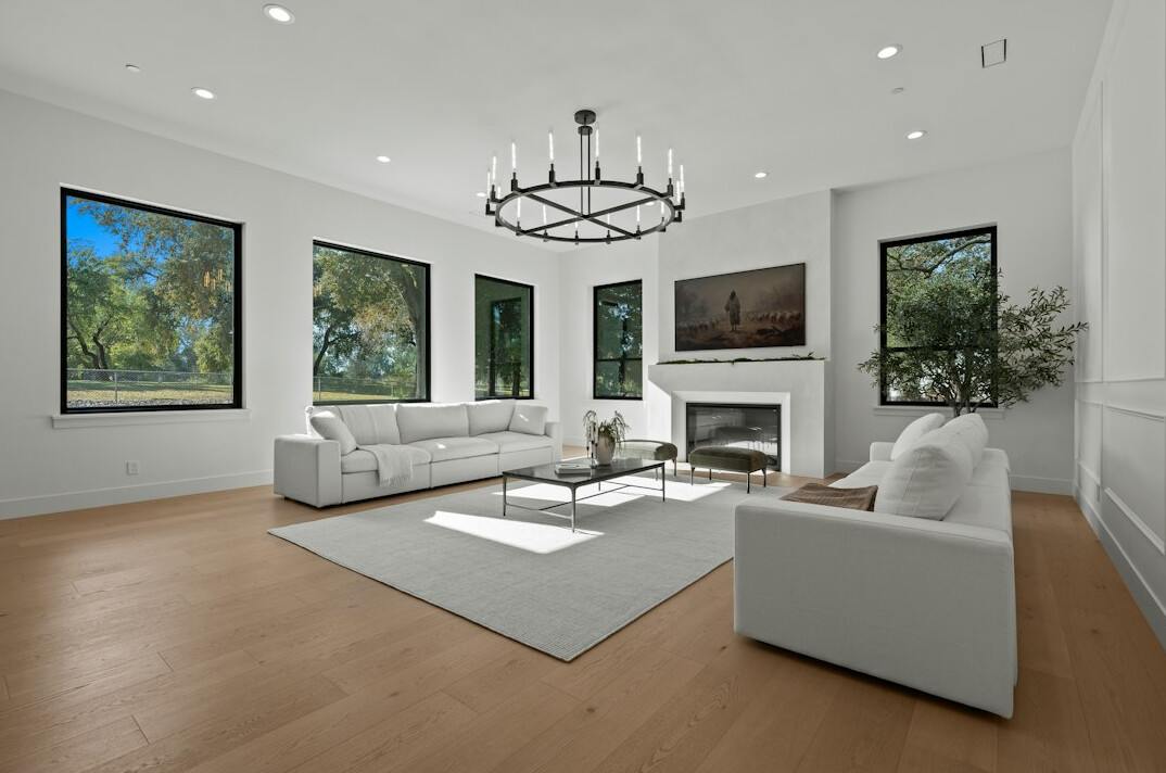 luxury living room with chandeliers
